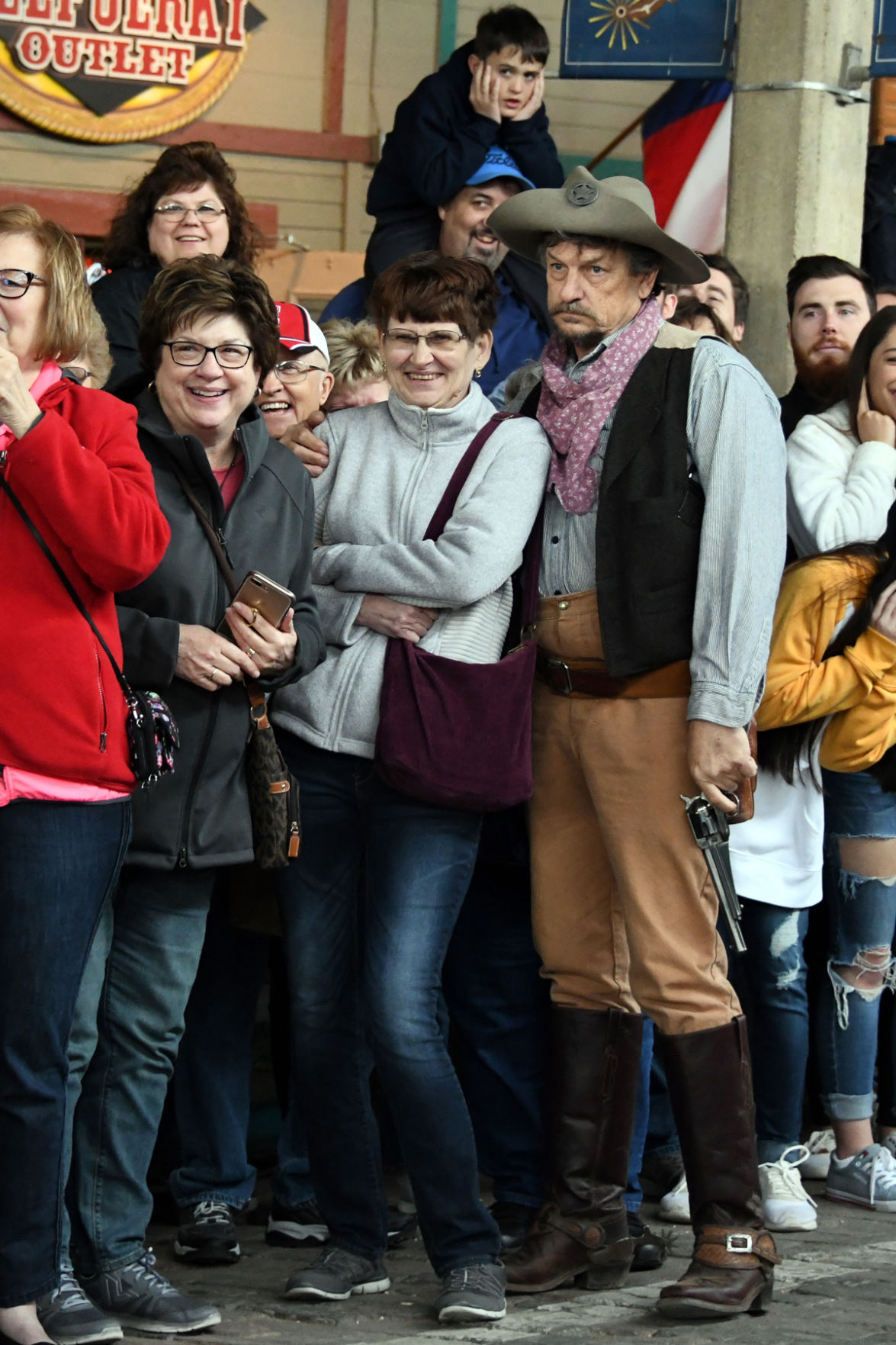 041 Doris Rogers gets a hug from the cowboy.JPG